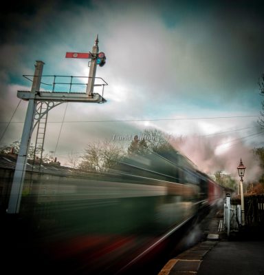 Steam train passing through